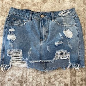 Distressed Denim skirt, never worn.